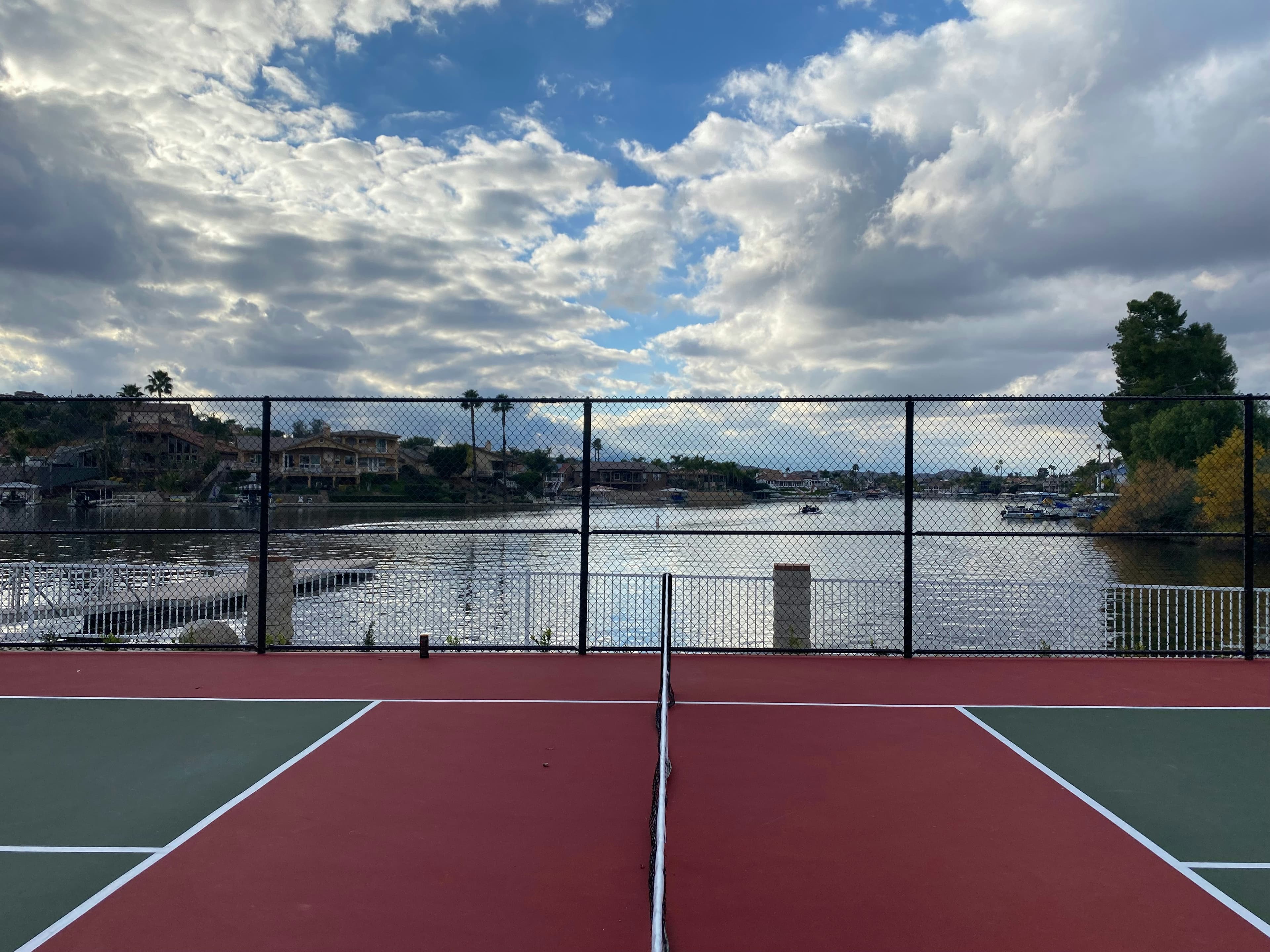 A pickleball court overlooking the water